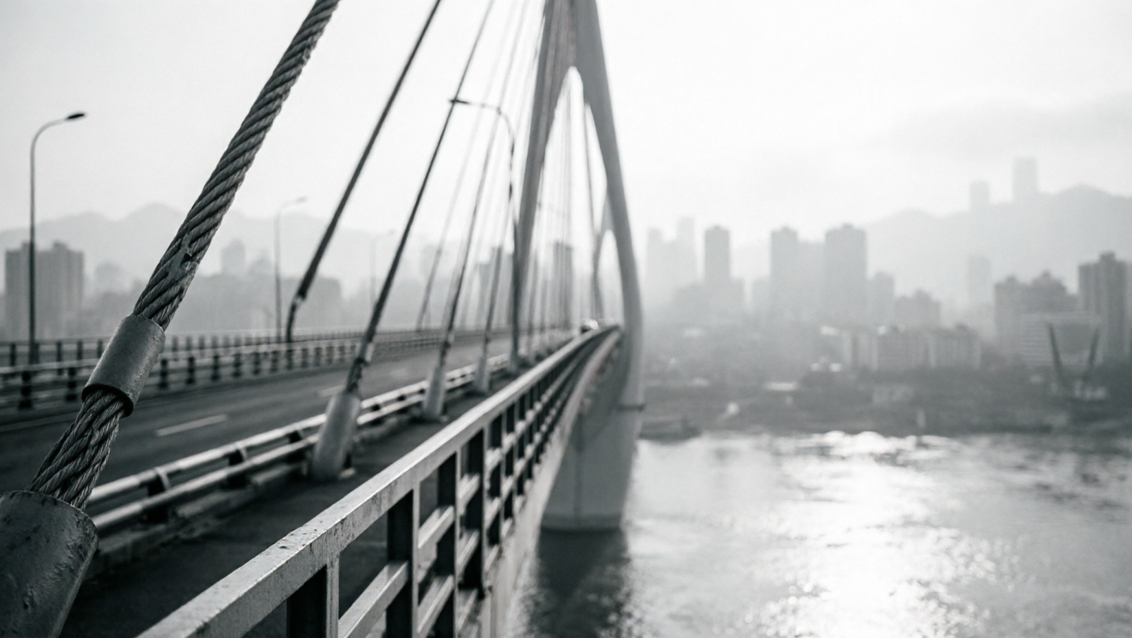 Morning light moving across bridges and rail in Chongqing